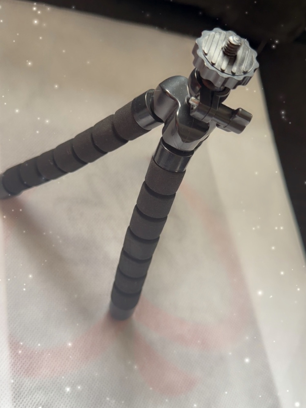 Compact Black Mini Tripod for Cameras and Video